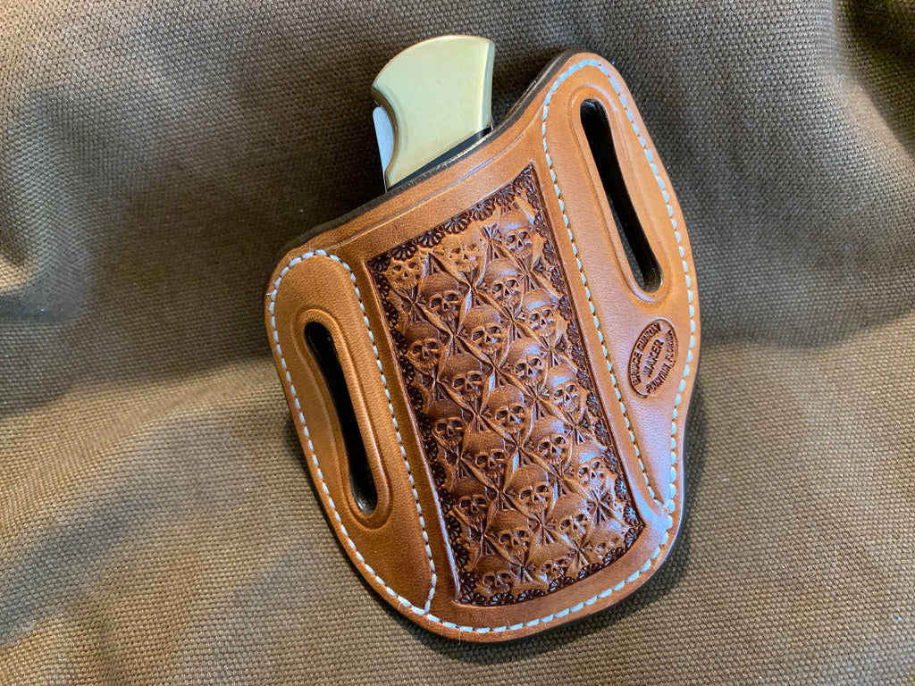 Gibson Skull Stamped Leather Knife Sheath for the Buck 112 in Natural Hermann Oak. Right-hand carry.