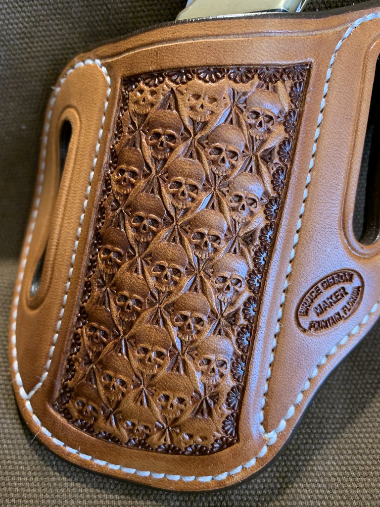Gibson Skull Stamped Leather Knife Sheath for the Buck 112 in Natural Hermann Oak. Right-hand carry.
